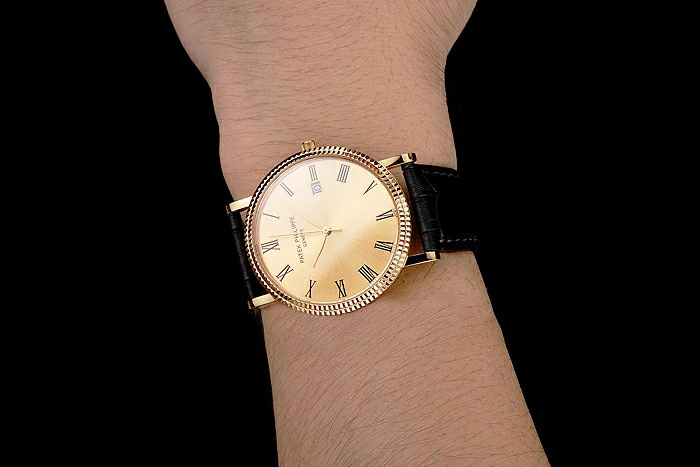 Patek Philippe Calatrava Gold Dial Roman Numerals Ribbed Bezel Gold Case Black Leather Strap new122479