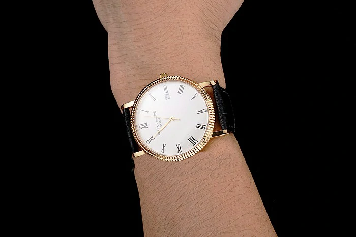 Patek Philippe Calatrava White Dial Roman Numerals Ribbed Bezel Gold Case Black Leather Strap new122487